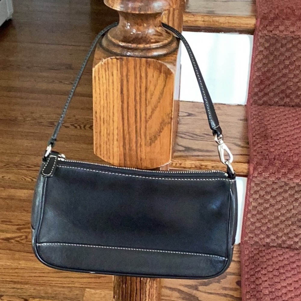 Coach leather mini bag, 8 3/4” L, 4 3/4” W, can be worn as a wristlet